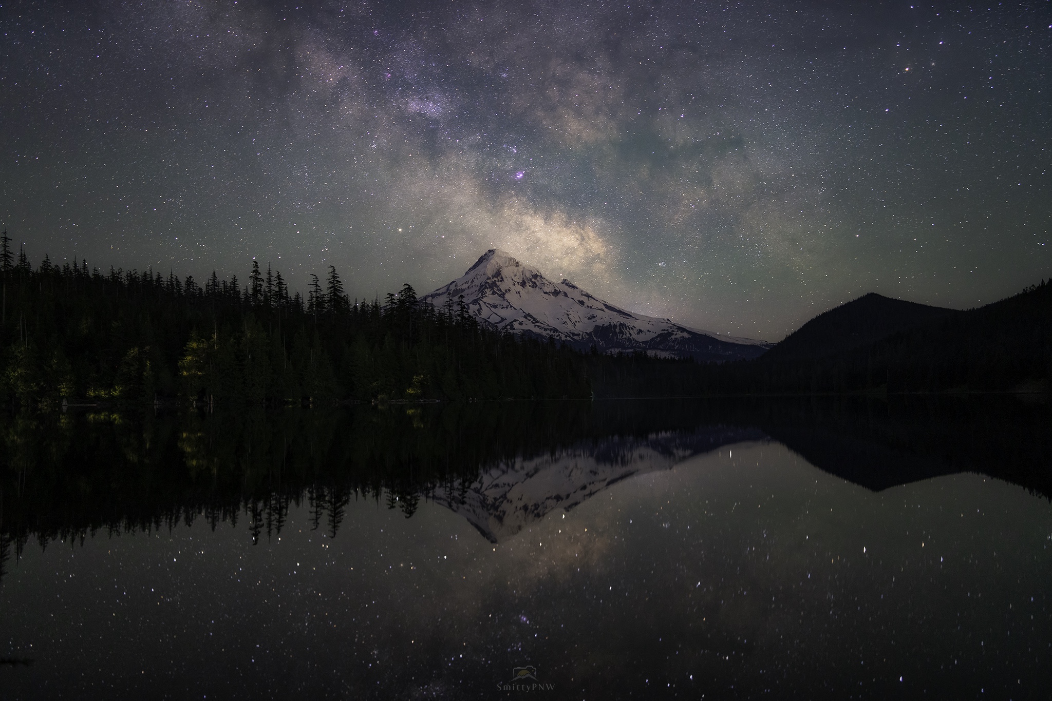 Milky Way rising over Mount Hood and reflected in a mountain lake